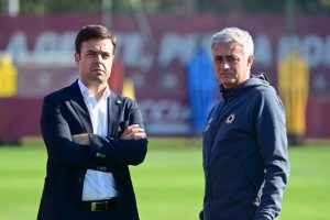 Jose Mourinho talks with Roma executive Tiago Pinto