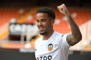 Dutch forward Justin Kluivert gestures during his official presentation as Valencia CF football club new player at Mestella stadium in Valencia on September 2, 2022. (Photo by Jose Jordan / AFP) (Photo by JOSE JORDAN/AFP via Getty Images)