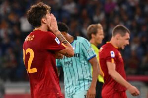AS Roma's Italian midfielder Nicolo Zaniolo reacts after missing a goal opportunity during the Italian Serie A football match between AS Roma and Atalanta Bergamo on September 18, 2022 at the Olympic stadium in Rome. (Photo by Andreas SOLARO / AFP) (Photo by ANDREAS SOLARO/AFP via Getty Images)