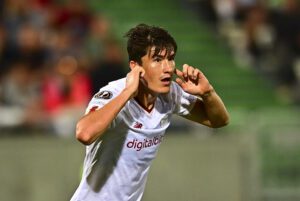 Eldor Shomurodov celebrates after scoring.