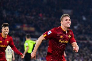 AS Roma's Norwegian forward Ola Solbakken (R) celebrates after opening the scoring during the Italian Serie A football match between AS Roma and Hellas Verona, on February 19, 2023 at the Olympic stadium in Rome. (Photo by Tiziana FABI / AFP) (Photo by TIZIANA FABI/AFP via Getty Images)