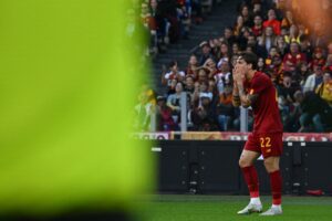 AS Roma's Italian midfielder Nicolo Zaniolo reacts after missing a goal opportunity during the Italian Serie A football match between AS Rome and Torino on November 13, 2022 at the Olympic stadium in Rome. (Photo by Andreas SOLARO / AFP) (Photo by ANDREAS SOLARO/AFP via Getty Images)