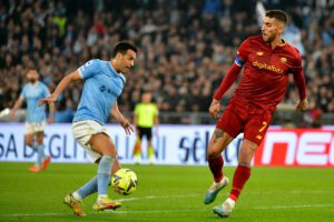 ROME, ITALY - MARCH 19: Pedro Rodriguez of SS Lazio competes for the ball with Lorenzo Pellegrini of AS Roma during the Serie A match between SS Lazio and AS Roma at Stadio Olimpico on March 19, 2023 in Rome, Italy. (Photo by Marco Rosi - SS Lazio/Getty Images)