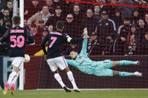 AS Roma's Italian midfielder Lorenzo Pellegrini takes a penalty against Feyenoord's Dutch goalkeeper Justin Bijlow during the UEFA Europa League first leg quarterfinal football match between Feyenoord and AS Roma at Feyenoord Stadion de Kuip in Rotterdam, on April 13, 2023. (Photo by MAURICE VAN STEEN / ANP / AFP) / Netherlands OUT (Photo by MAURICE VAN STEEN/ANP/AFP via Getty Images)
