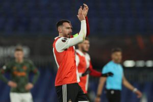 ROTTERDAM, NETHERLANDS - MARCH 16: Orkun Kokcu of Feyenoord celebrates after scoring the team's second goal during the UEFA Europa League round of 16 leg two match between Feyenoord and Shakhtar Donetsk at Feyenoord Stadium on March 16, 2023 in Rotterdam, Netherlands. (Photo by Dean Mouhtaropoulos/Getty Images)
