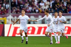 TURIN, ITALY - APRIL 08: Paulo Dybala of AS Roma celebrates with teammate Diego Llorente after scoring the team's first goal during the Serie A match between Torino FC and AS Roma at Stadio Olimpico di Torino on April 08, 2023 in Turin, Italy. (Photo by Valerio Pennicino/Getty Images)