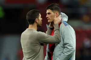 LEVERKUSEN, GERMANY - NOVEMBER 01: Xabi Alonso speaks to Patrik Schick of Bayer 04 Leverkusen after the UEFA Champions League group B match between Bayer 04 Leverkusen and Club Brugge KV at BayArena on November 01, 2022 in Leverkusen, Germany. (Photo by Lars Baron/Getty Images)