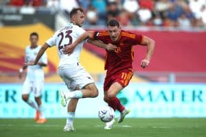 ROME, ITALY - AUGUST 20: Andrea Belotti of AS Roma and Norbert Gyomber of US Salernitana compete for the ball during the Serie A TIM match between AS Roma and US Salernitana at Stadio Olimpico on August 20, 2023 in Rome, Italy. (Photo by Paolo Bruno/Getty Images)